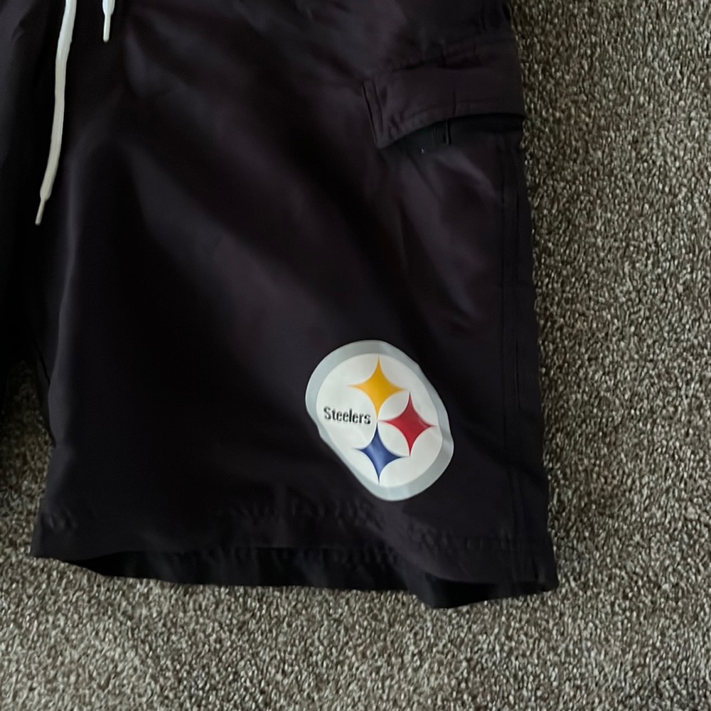 Men’s medium NFL Steeler Swim Trunks